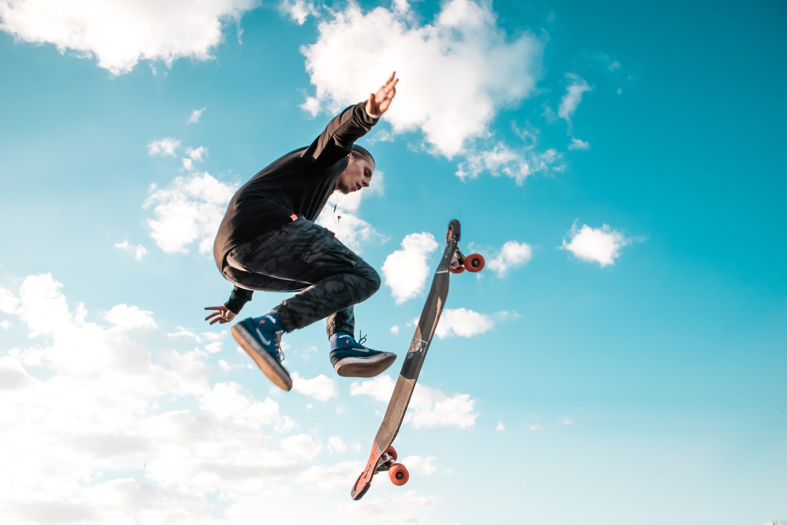 man jump with skateboard
